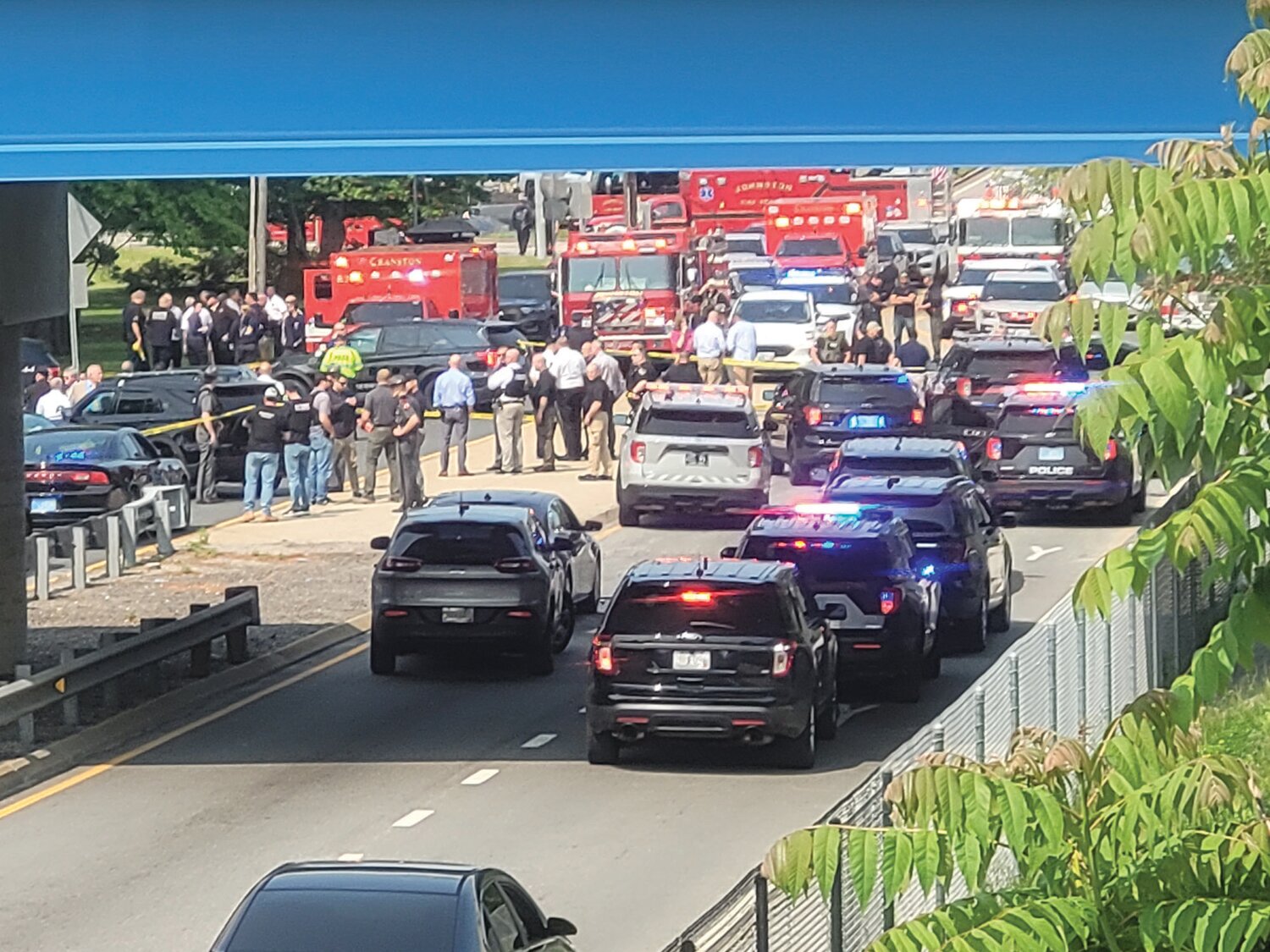 HEAVY POLICE PRESENCE: Police from multiple departments converged on a shooting suspect’s car along Plainfield Pike, on the Johnston/Cranston border, early Wednesday morning, May 24, 2023.